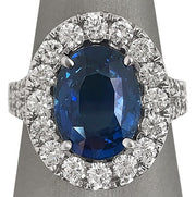 6.11 ct No heat Blue sapphire diamond halo Ring