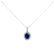 A close detailitn the brilliant blue sapphire center with sparkling diamond halo.