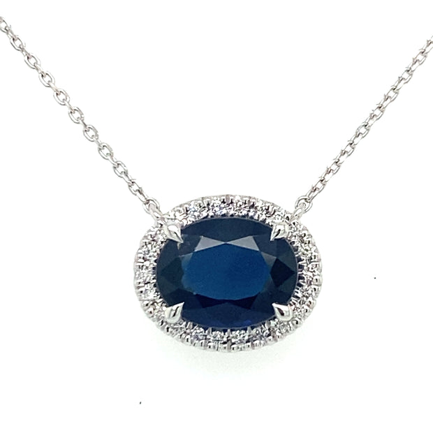 1.86 carat sapphire pendant with 0.09 carat diamond halo set in 18K white gold, displayed on a matching necklace chain