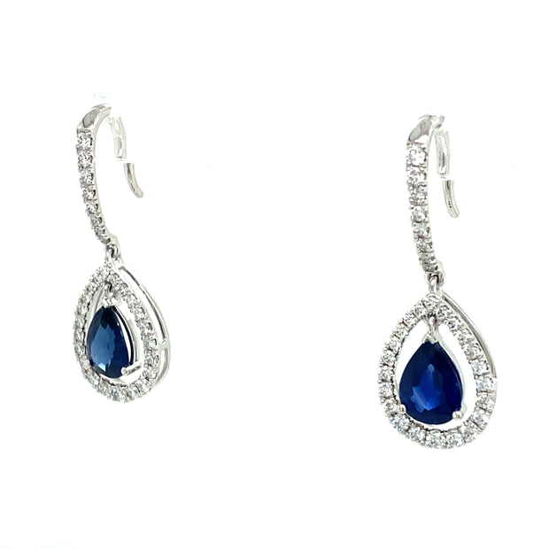 Elegant pear sapphire earrings accented with round brilliant diamonds