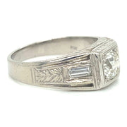 Side profile revealing the elegant 18K white gold setting, and accent baguette diamonds.
