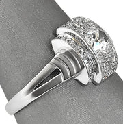 Side profile showing the graceful rise of the setting and antique craftsmanship.
