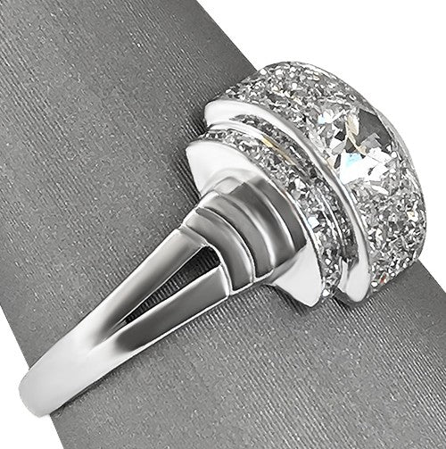 Side profile showing the graceful rise of the setting and antique craftsmanship.