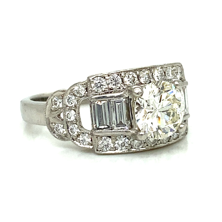 Timeless platinum with classic cut diamonds set in vintage charm.
