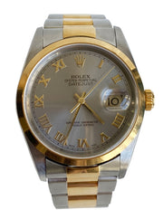 A close up of the Rolex Datejust Two Tone, with silvered dial and gold Roman numerals.