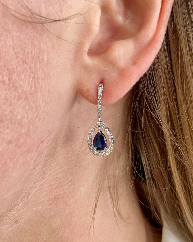 Blue sapphire and diamond dangle earrings in 18K white gold
